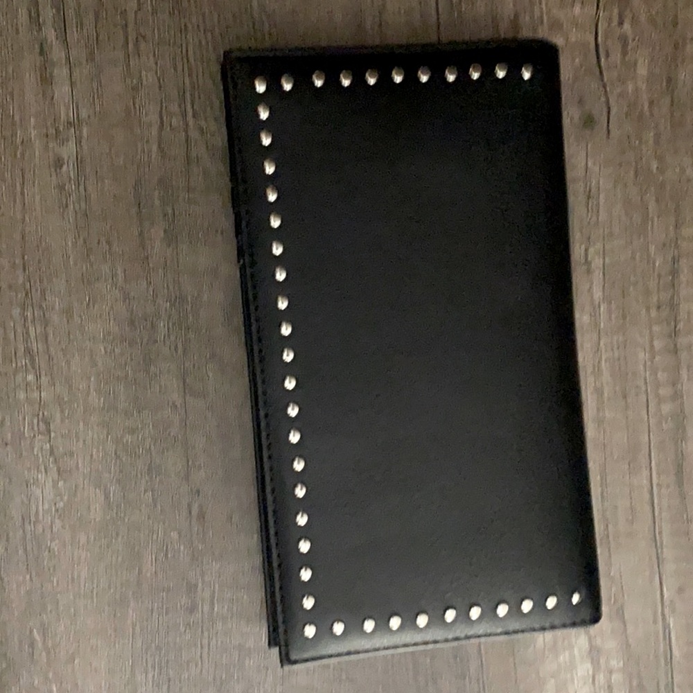 Black studded clutch